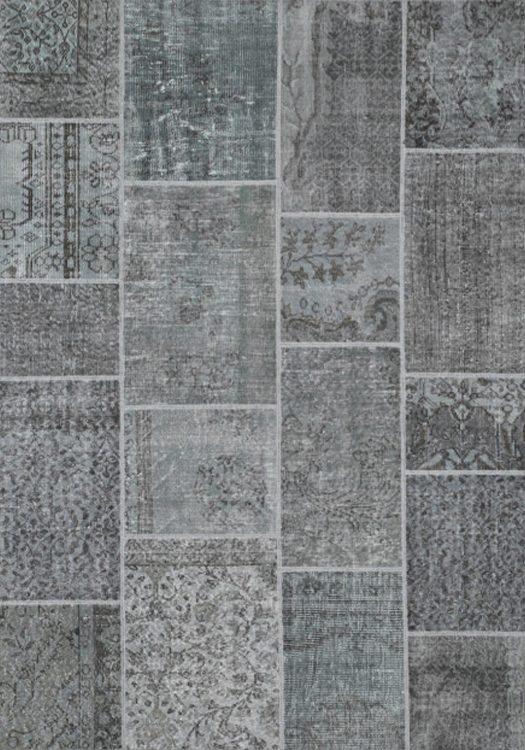 Ankara Patch carpet, in the color grey, from the Wool Collection. - Ankara Patch vloerkleed, in de kleur grijs, uit de Wol Collectie.