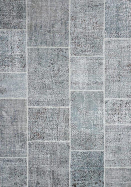Ankara Patch carpet, in the color water green, from the Wool Collection. - Ankara Patch vloerkleed, in de kleur watergroen, uit de Wol Collectie.
